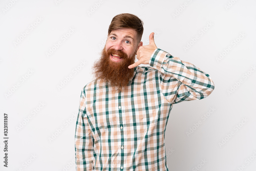 Redhead man with long beard over isolated white background making phone gesture. Call me back sign Redhead man with long beard over isolated white background making phone gesture. Call me back sign