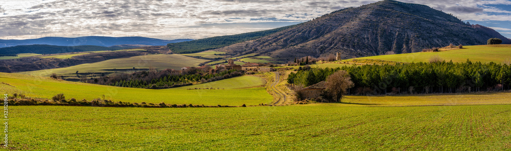 panorama of green meadows and uninhabited villages in the highlands, spain - obrazy, fototapety, plakaty 
