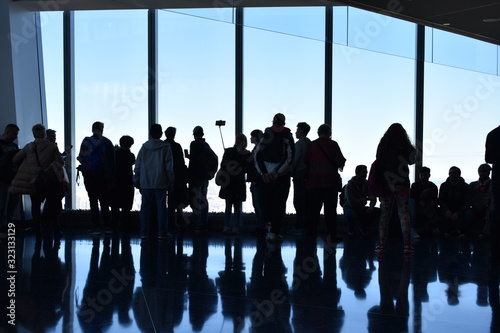 silhouettes of people in airport © Gutemberg&Jay
