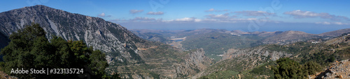panorama, view in the mountains, with a beautiful panoramic view about a green valley 