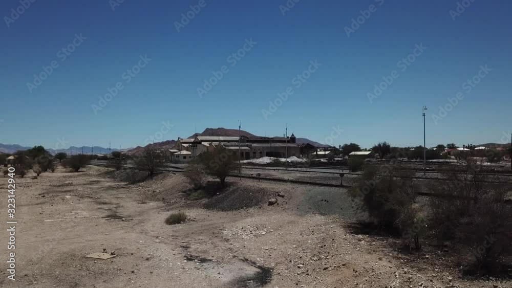 4K aerial drone video of Usakos, small town in Erongo Mountains near B1 highway to west coast of Namibia and its old historical railway water towers on hot sunny day, Erongo Region, central Namibia 4K aerial drone video of Usakos, small town in Erongo Mountains near B1 highway to west coast of Namibia and its old historical railway water towers on hot sunny day, Erongo Region, central Namibia