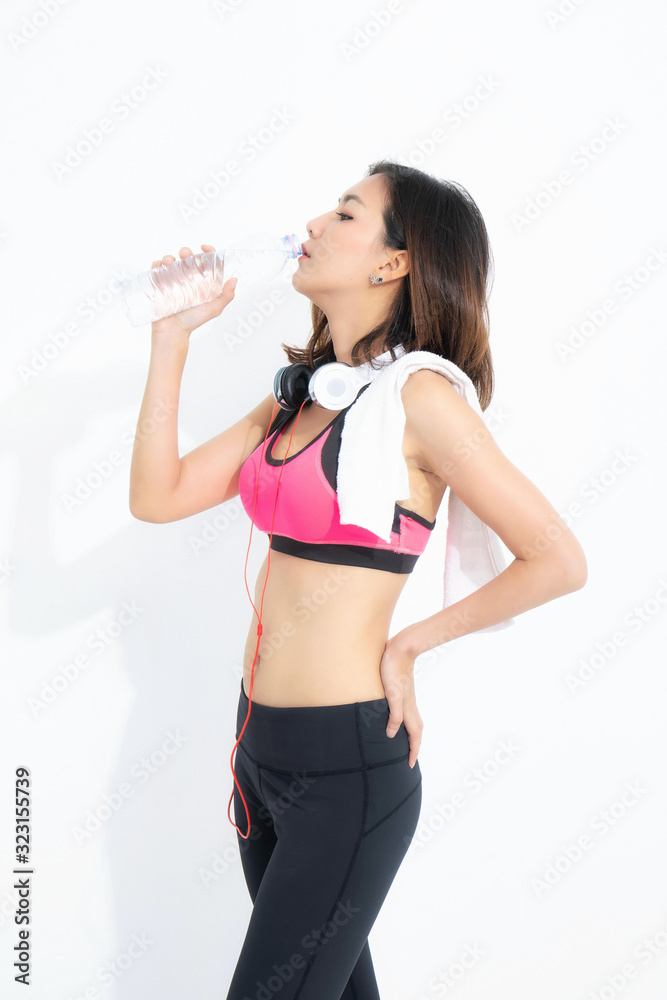 Growth portrait of fitness woman in sportswear. Growth portrait of fitness woman in sportswear.