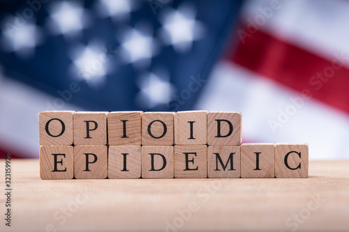 Opioid Epidemic Text On Cork Over American Flag
