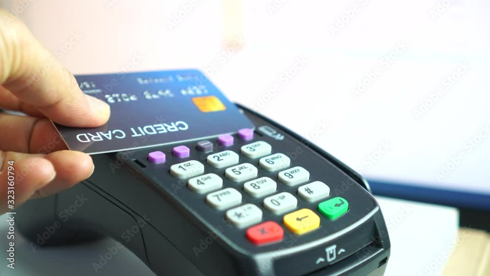 Customer using credit cards (mock up) scan nfc for payment, Contactless payments systems credit cards and debit cards, smart cards, Some suppliers claim transactions,business service trade concept