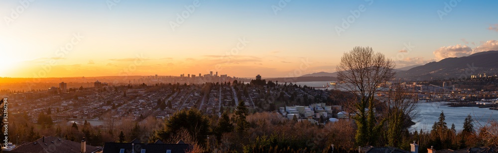 Burnaby, Greater Vancouver, British Columbia, Canada . Beautiful Panoramic View of the city from the top of the hill during a colorful winter sunset.