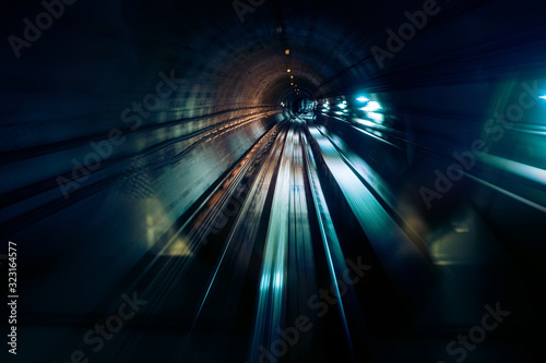 Train moves underground, motion blurred image of the subway