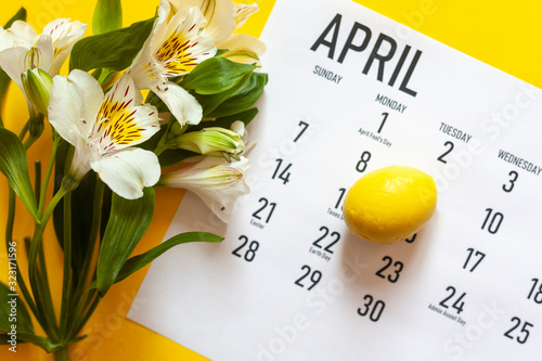 Canvas Print April 2020 monthly calendar with yellow easter egg on the bright yellow background