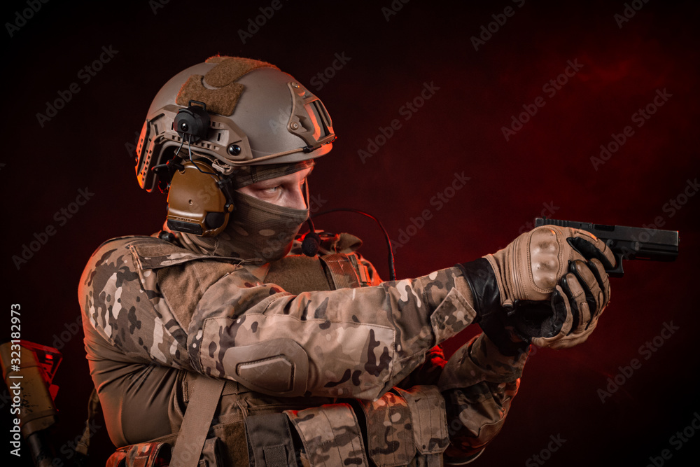 special forces soldiers in a helmet with a gun