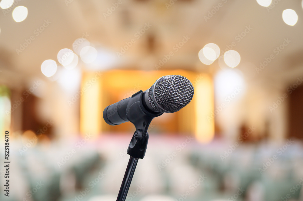 Microphone over the blurred business people forum Meeting Conference Training Learning Coaching Concept, Blurred background.