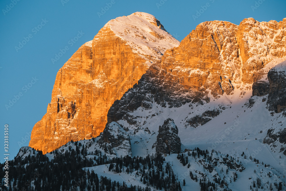 Fototapeta premium Tofana di Rozes Peak in Cortina d'Ampezzo in Winter at Dawn with Slopes