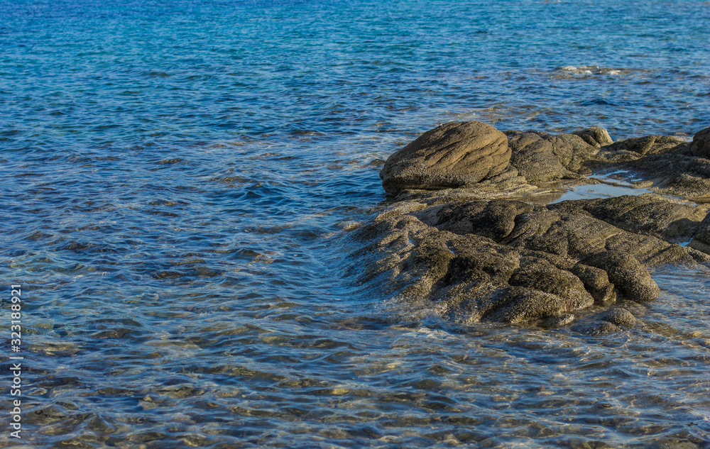 nature stone shore line scenic view with rocks and blue water wavy surface simple outside background nature stone shore line scenic view with rocks and blue water wavy surface simple outside background