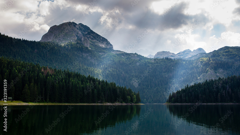 Beautiful mountain landscape with a lake and forest. Park Durmitor in Montenegro.