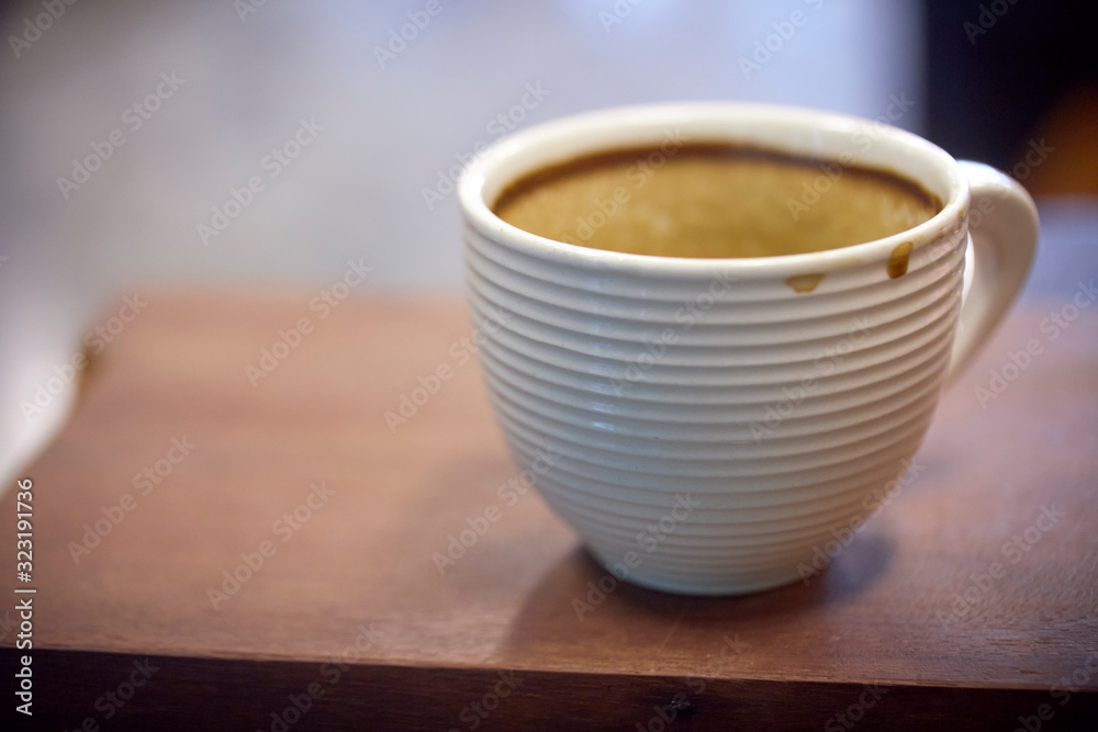 Cup of fresh coffee on wooden background Cup of fresh coffee on wooden background