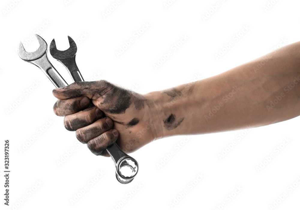 Auto mechanic holding wrenches isolated on white, closeup Auto mechanic holding wrenches isolated on white, closeup