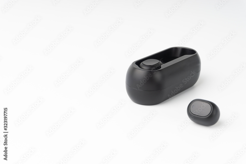 Wireless earbuds or earphones on white background. Copy space and technology concept Wireless earbuds or earphones on white background. Copy space and technology concept