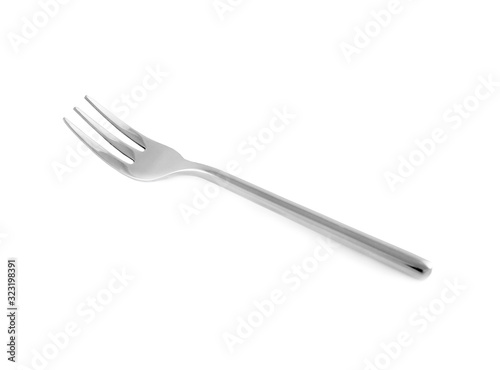 Clean shiny metal fork isolated on white