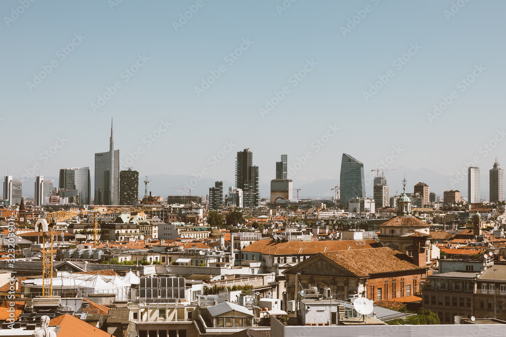 Panoramic view of Milan city with modern buildings from Milan Cathedral Panoramic view of Milan city with modern buildings from Milan Cathedral