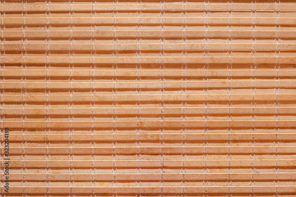 Closeup tropical bamboo curtain in Japanese restaurant. Abstract texture wallpaper. Closeup tropical bamboo curtain in Japanese restaurant. Abstract texture wallpaper.