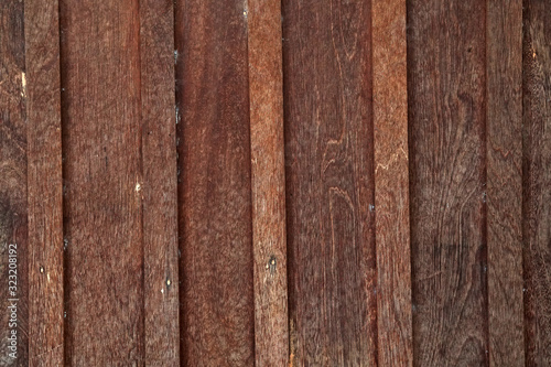 Loft style dark blown wood planks surface texture background