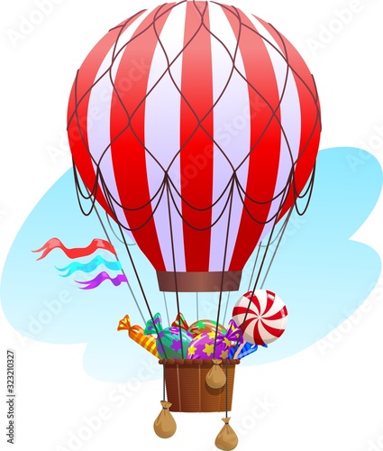 Hot air balloon. Balloon with a basket filled with sweets.