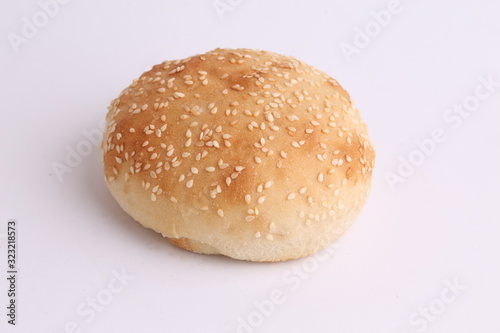 delicious bread rolls on colored background