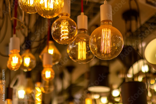 Various incandescent lamps in a store. Energy saving concept.