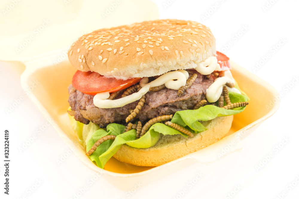 Burger of endible worms  with tomato and lettuce