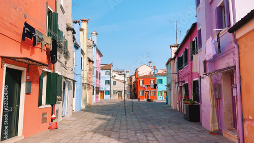 BURANO, ITALY - JANUARY 20, 2020: Colorful houses on the island of Burano in Italy. Burano island is famous for its colorful fisherman's houses.. © Nastya Tepikina