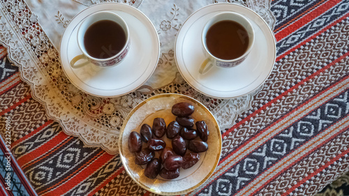 Traditional Arabian Coffee Served with Dates. Top View