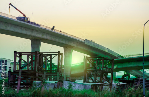 Construction site of road bridge with sunset sky © Nuttapon