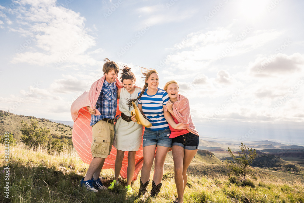 Group of friends hanging out in the foothills having fun. Bridger, Montana, USA Group of friends hanging out in the foothills having fun. Bridger, Montana, USA