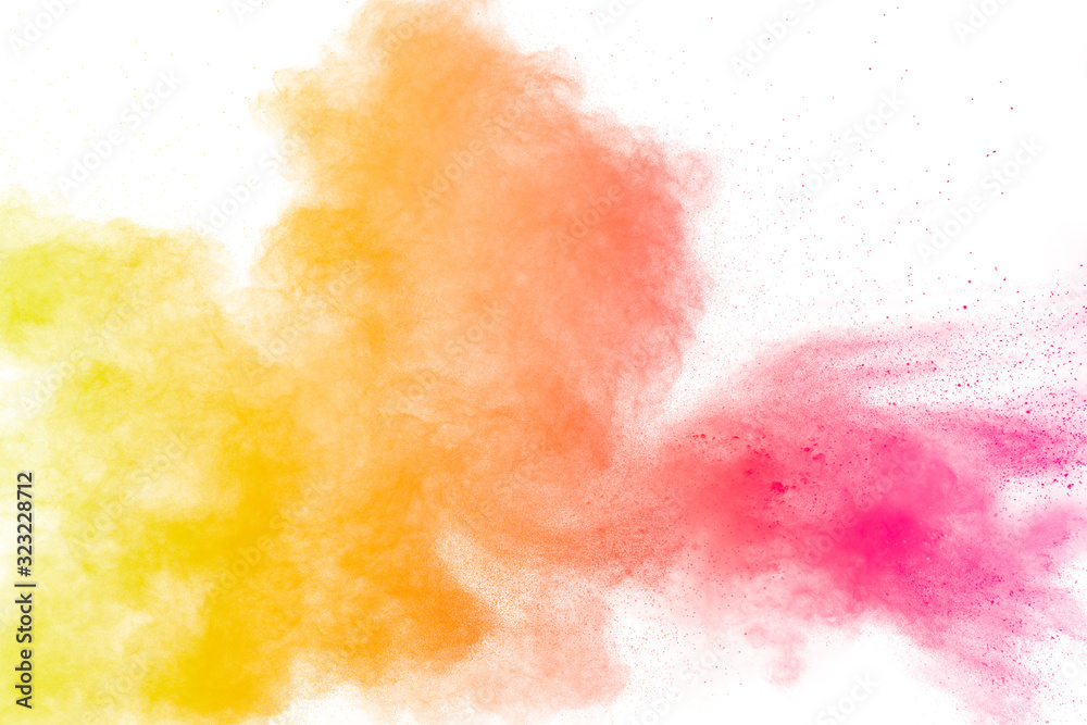 Red yellow  powder explosion on white background.Red yellow color dust splash clouds.