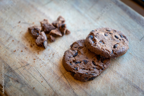 Broken chocolate chip cookies. Cookies broken in pieces with crumbs - concept image for internet privacy and data security