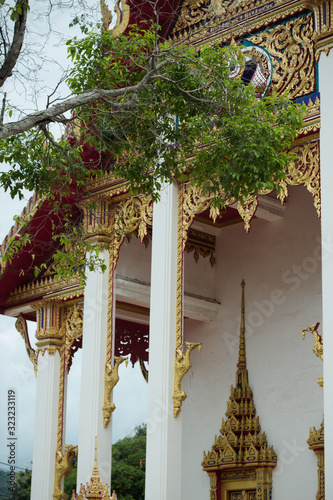 Wat Chalong, Phuket, Thailand - July 20, 2019: Hall of initiation Wat Chalong or Wat Chantharam. photo