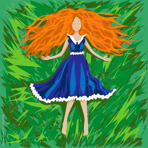 Freckles girl with ginger hair lying on the grass and smiling