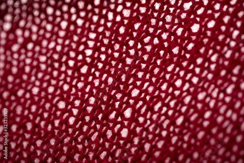 Knitting Background. Maroon. texture knitted yarn, dark red color, textile. 