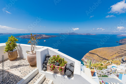 Beautiful view of picturesque town in Santorini, caldera and volcano on the Mediterranean Sea. Traditional white architecture, holiday island of luxury summer vacation destination in Greece