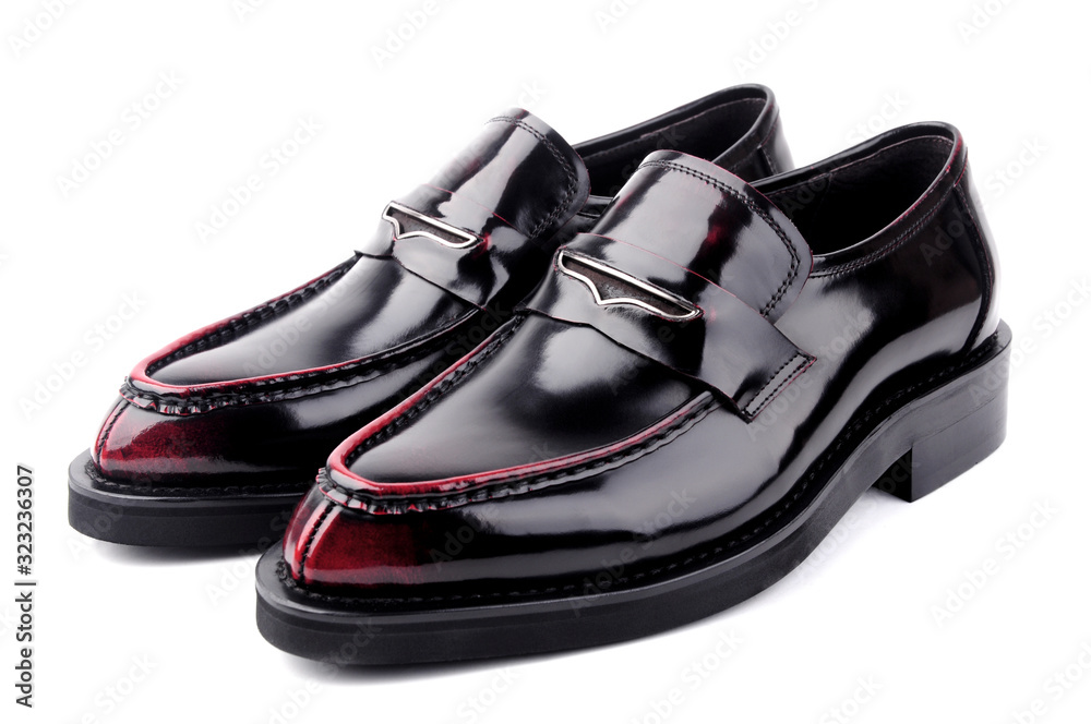 A pair of wine red leather shoes