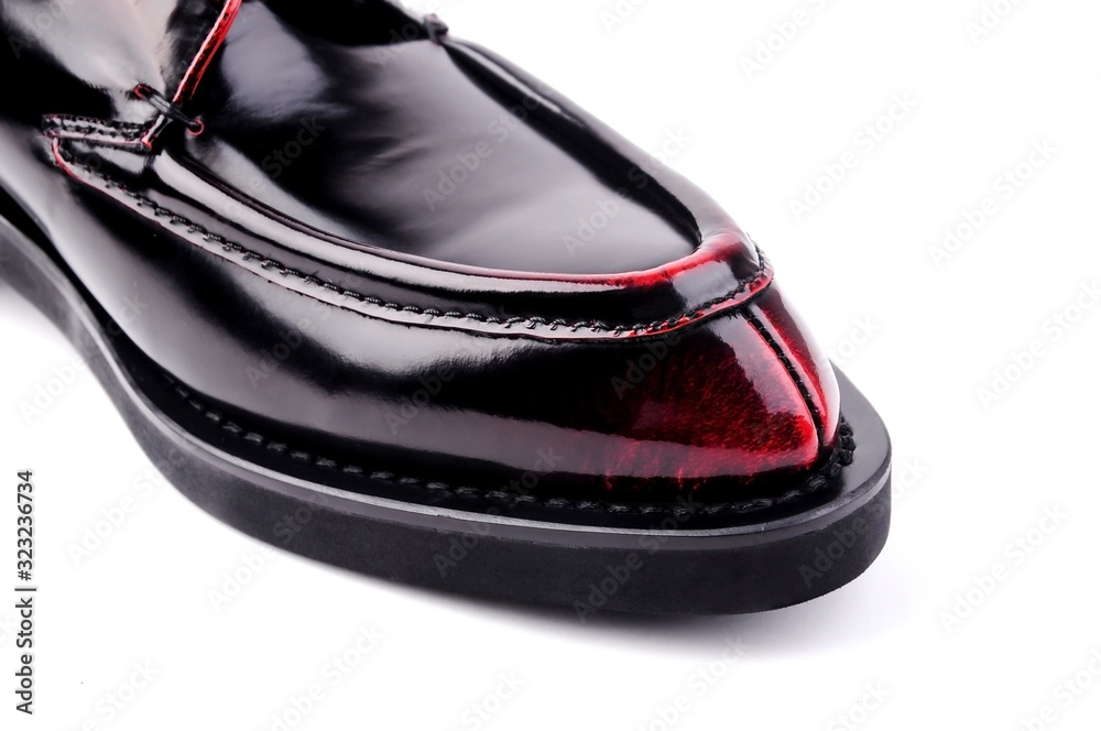 Φωτογραφία Close-up of the toe of dark wine red leather shoes