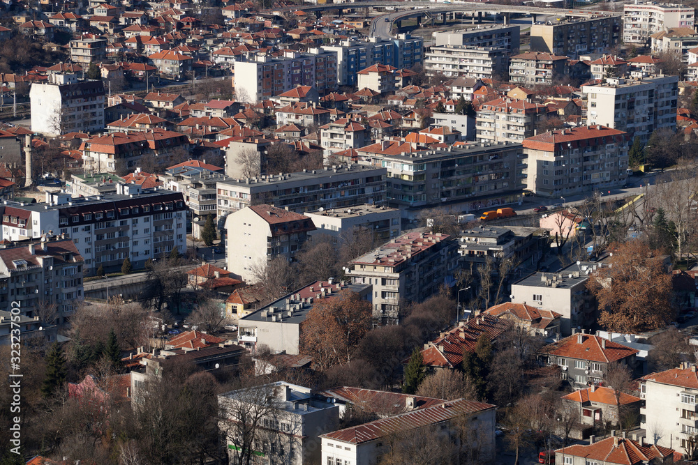 Bulgaria cityscape, top view on tiled roofs of houses