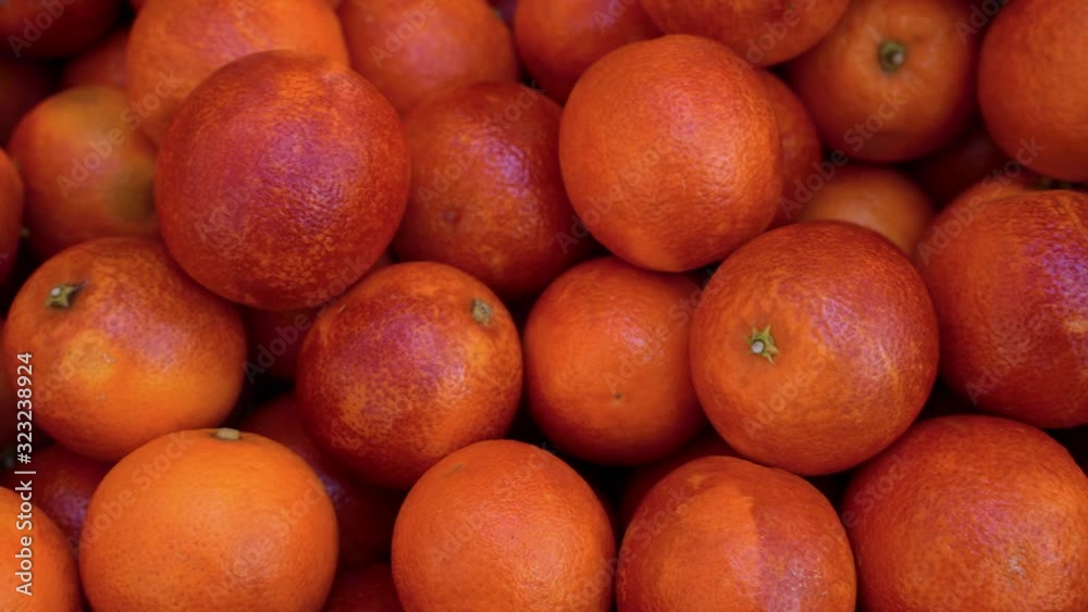 Organic fresh sicilian oranges sold by vendors in a farmer's market in Piazza Verga, Catania, Sicily Organic fresh sicilian oranges sold by vendors in a farmer's market in Piazza Verga, Catania, Sicily