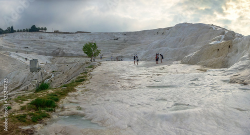 People climbing the hill of Pamukkale in Turkey