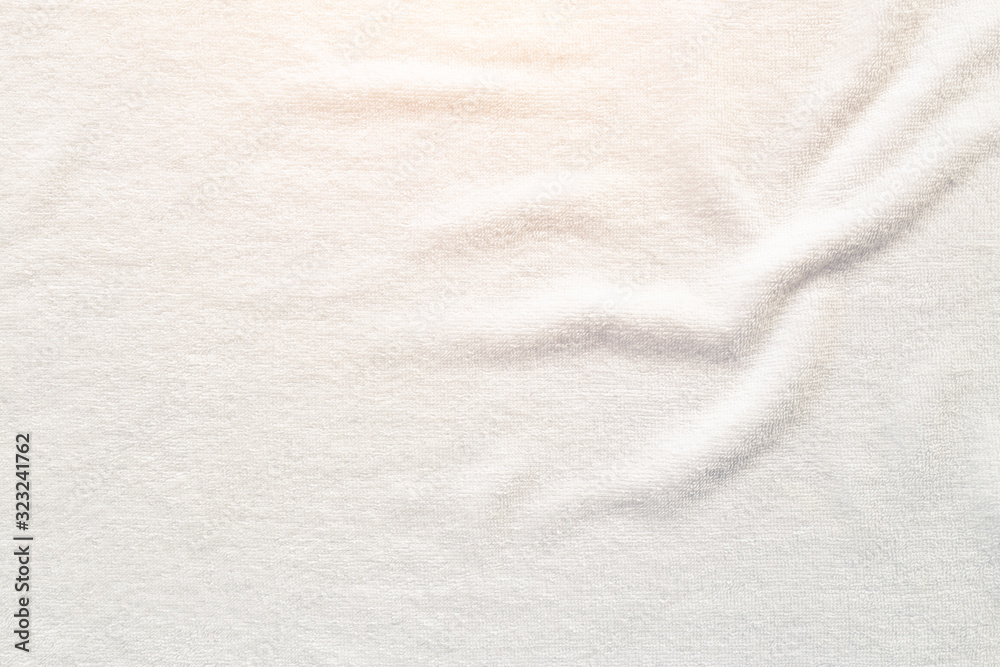 White towel texture for background. That fabric or textile consist of cotton fiber material. Look plush, fluffy, dry, soft and clean. For background about baby, spa, hotel, laundry and hygiene etc. White towel texture for background. That fabric or textile consist of cotton fiber material. Look plush, fluffy, dry, soft and clean. For background about baby, spa, hotel, laundry and hygiene etc.