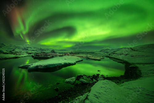 jökulsárlón lagoon under the aurora borealis or northen lights, Iceland