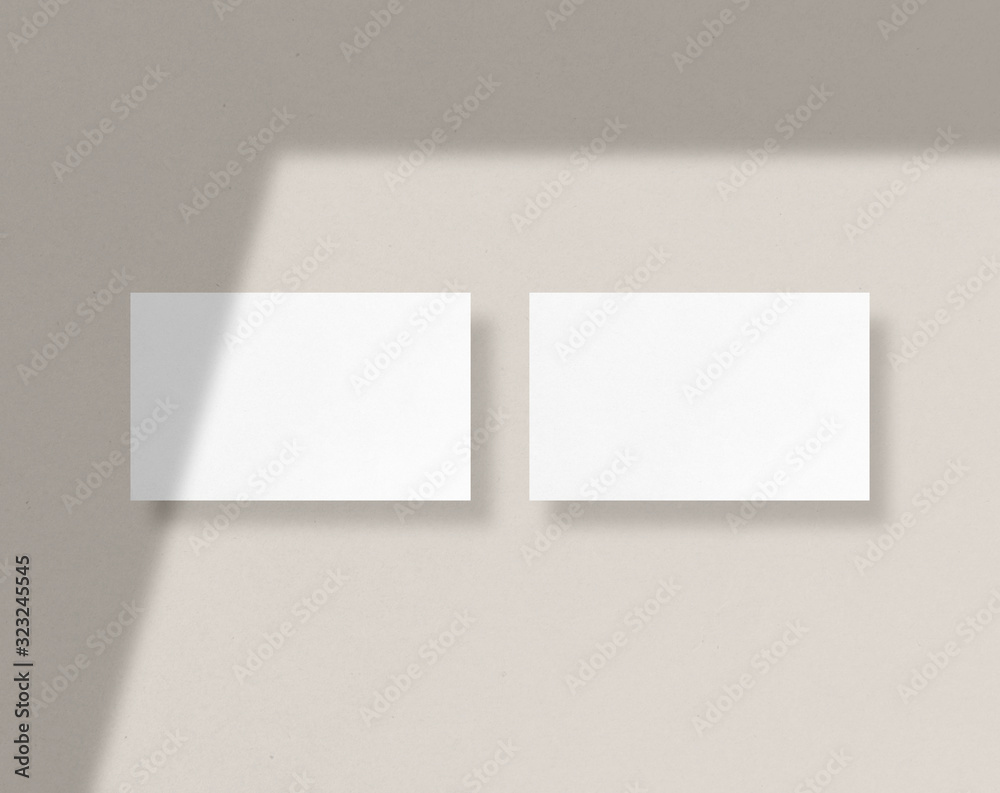 Blank white business cards mockups with shadow Overlays. Mockup scene. Photo mockup with clipping path. Blank white business cards mockups with shadow Overlays. Mockup scene. Photo mockup with clipping path.