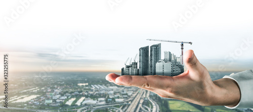 Innovative architecture and civil engineering building construction project. Creative graphic design showing concept of infrastructure city building by professional architect, worker and engineer.