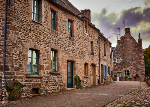 Fototapeta Naklejka Na Ścianę i Meble -  Image of a small street in Lehon, Brittany, France