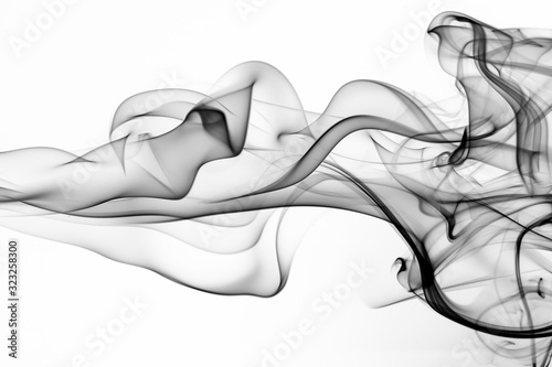 toxic smoke movement on white background. black ink water