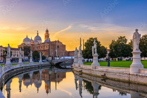 View of canal with statues on square Prato della Valle in Padova (Padua), Veneto, Italy,