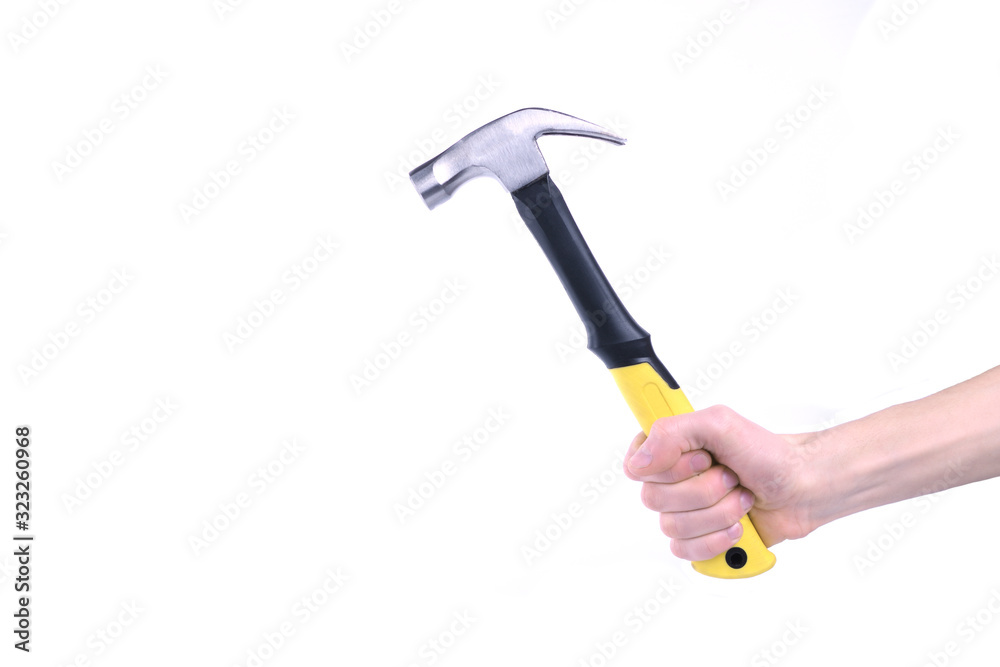 Hand holds hammer isolated on white background